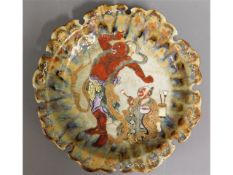 A 19thC. Japanese, high fired glaze crimped edged stoneware bowl with enamelled & gilded decor depic