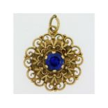 A 9ct gold mounted pendant with blue paste stone,