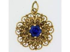 A 9ct gold mounted pendant with blue paste stone,