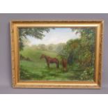A framed oil of horses in wooded field, signed W.