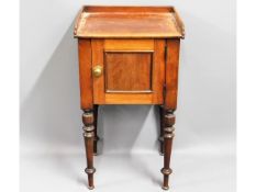 A small Victorian mahogany pot cupboard with galle