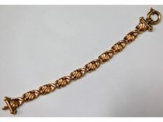 A decorative 9ct gold bracelet, 16.3g, 7.5in long