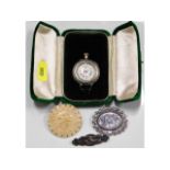 A silver nurses fob watch & case (not running) twi