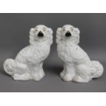 A pair of 19thC. Staffordshire dogs, 11.875in tall