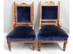 A pair of upholstered Edwardian mahogany low level