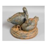 A Victorian cast iron duck door stop, 8.25in wide