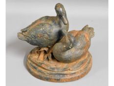 A Victorian cast iron duck door stop, 8.25in wide