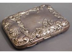 A late Victorian Birmingham embossed silver cigare