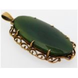 A 9ct gold mounted jade pendant, 53.5mm high, 9.2g