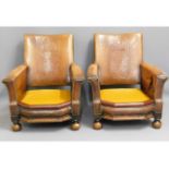 A pair of early 20thC. antique club chairs with ca