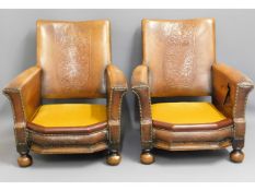 A pair of early 20thC. antique club chairs with ca