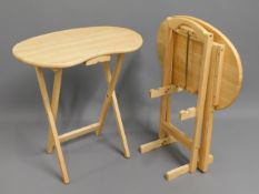 A pair of integrated beech occasional tables £10-1