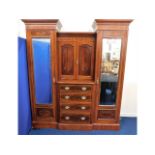 A c.1900 Mahogany gentleman's compactum, 84in high