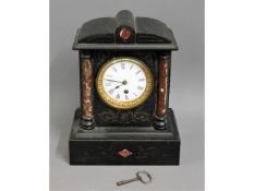 A Victorian slate mantle clock, 12.25in tall