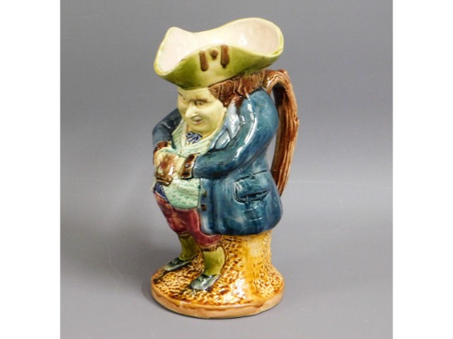 A Victorian majolica Toby jug, 10.5in tall