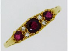 An antique style 18ct gold ring set with ruby & diamond, 2.7g, size O