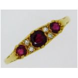 An antique style 18ct gold ring set with ruby & diamond, 2.7g, size O