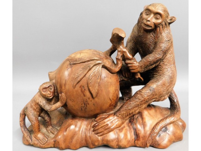 An early 20thC. Chinese carved hardwood monkey & p