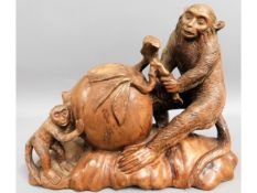 An early 20thC. Chinese carved hardwood monkey & p