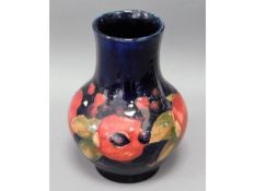 A mid 20thC. Moorcroft pomegranate vase with blue