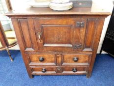 An early 19thC. oak credence cupboard, 37in wide x