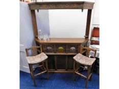 An Old Charm oak home bar with two stools, shelf rack, optics & glasses supplied, 64.75in high x 62.