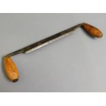 An antique two handled chisel