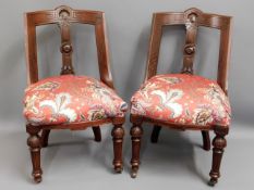 A pair of decorative, upholstered hall chairs