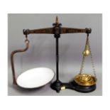 A set of cast iron & brass Barrett & Son scales made for R. Faull Liskeard with weights