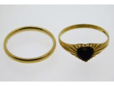 A 9ct gold band size N/O twinned with a 9ct gold h