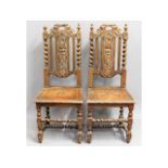 A pair of Victorian oak hall chairs, finial loss o