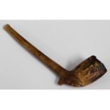 A Victorian clay pipe depicting footballers, 5in l