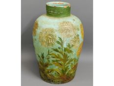 An antiquated, heavy terracotta jar with hand pain