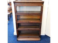 A Gunn mahogany sectional lawyers bookcase, 55.5in