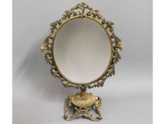 A decorative brass mirror, 19.25in high