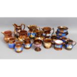 A quantity of copper lustre ware jugs & vases