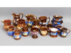 A quantity of copper lustre ware jugs & vases