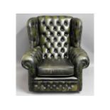 A leather button back Chesterfield armchair, 35in