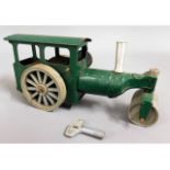 A tin plate clockwork steam roller, working order