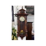 A large mahogany continental regulator clock, 51in