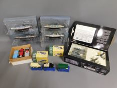 A quantity of boxed Corgi & Atlas diecast toys