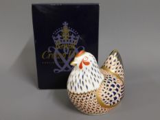 A Royal Crown Derby porcelain paperweight with box