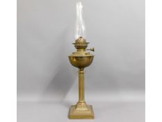 A Victorian brass oil lamp, 28in high