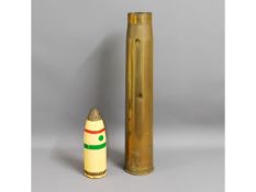 A large shell casing stick stand, 26.5in tall, twi