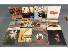 A quantity of 38 vinyl LP's including Graeme Edge Band, Ray Thomas, The Hollies, Moody Blues, The Be