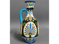 A French Longwy enamelled faience ewer, 9.5in tall