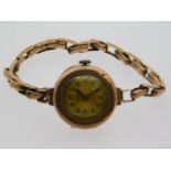 A 9ct gold wrist watch by James Walker, London, runs when wound, case diameter 22mm, 19.9g