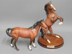 A Beswick "Spirit of the Wild" twinned with anothe