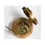 A brass Stanley of London compass with wooden stor