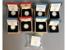 Nine Royal Mint silver proof £1 coins